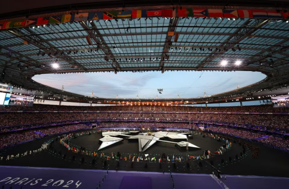 [10/12]Paris 2024 Olympics - Ceremonies - Paris 2024 Closing Ceremony - Stade de France, Saint-Denis, France - August 11, 2024. General view of the stadium with flagbearers lined-up. Photo: Reuters