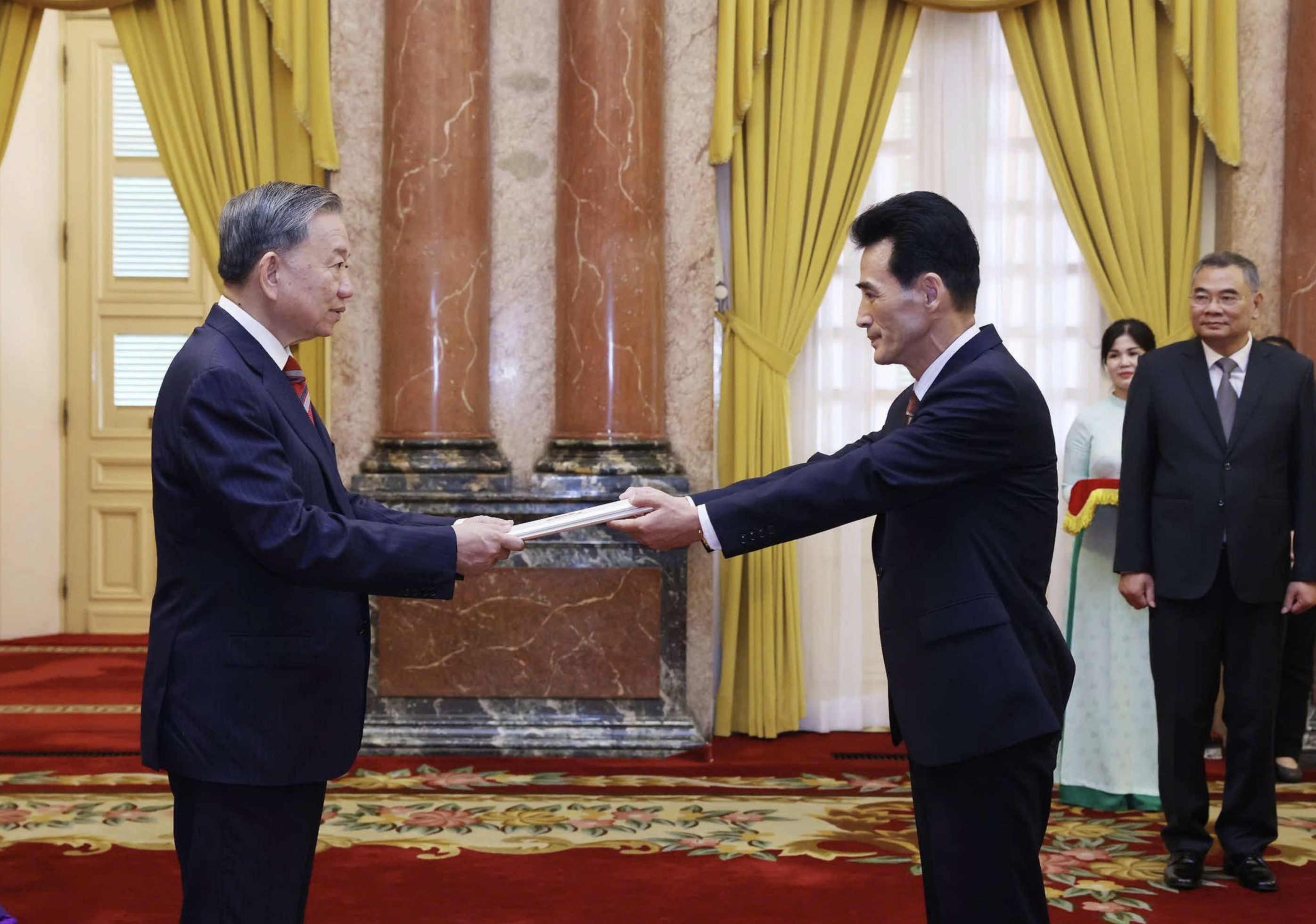 Party General Secretary and State President To Lam (L) receives the credentials from North Korean Ambassador Ri Sung Guk on August 12, 2024. Photo: Vietnam News Agency