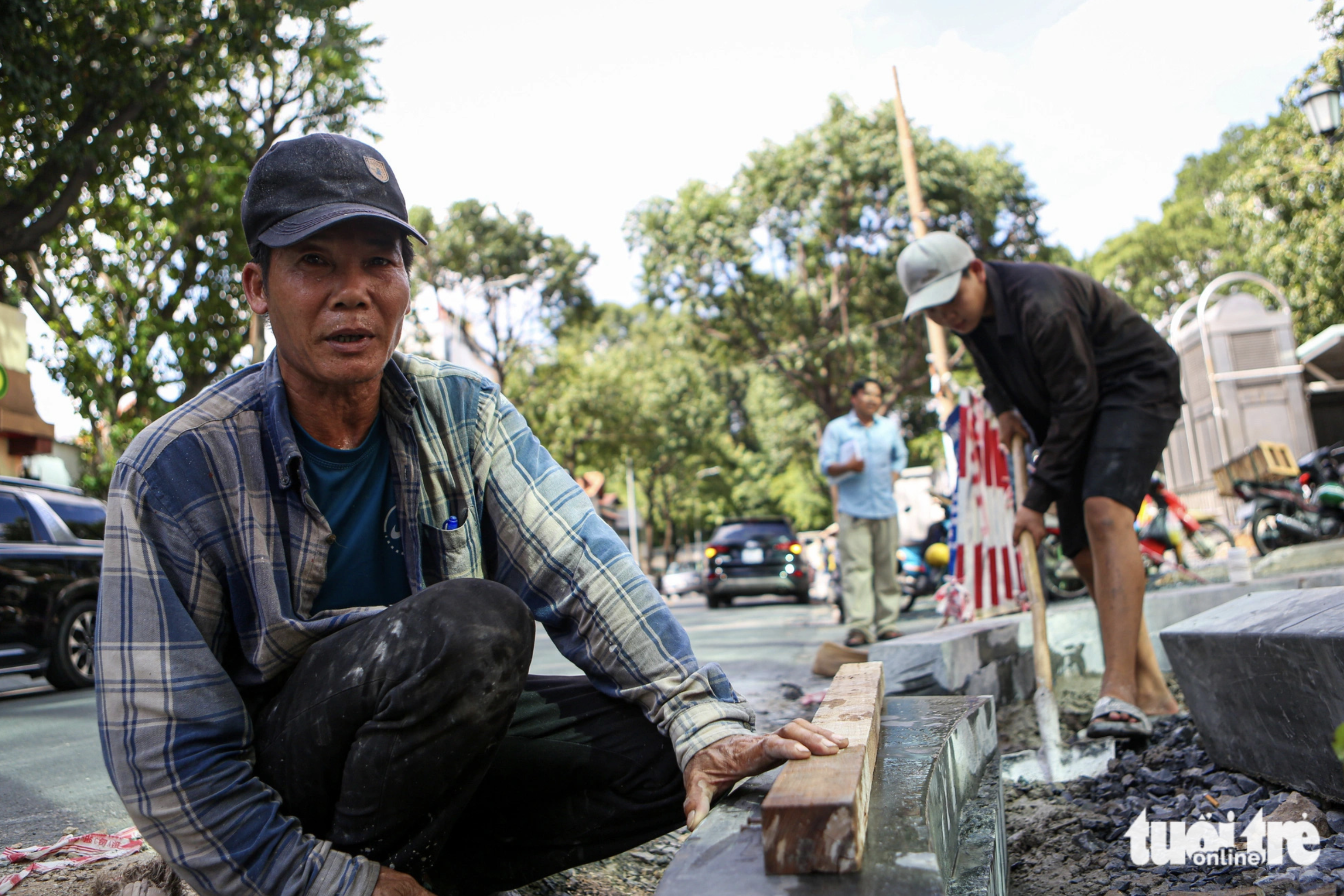 After bumpy pavements are repaved with granite, residents will feel comfortable and convenient to walk, said Minh Toan, a worker for the pavement upgrade project.