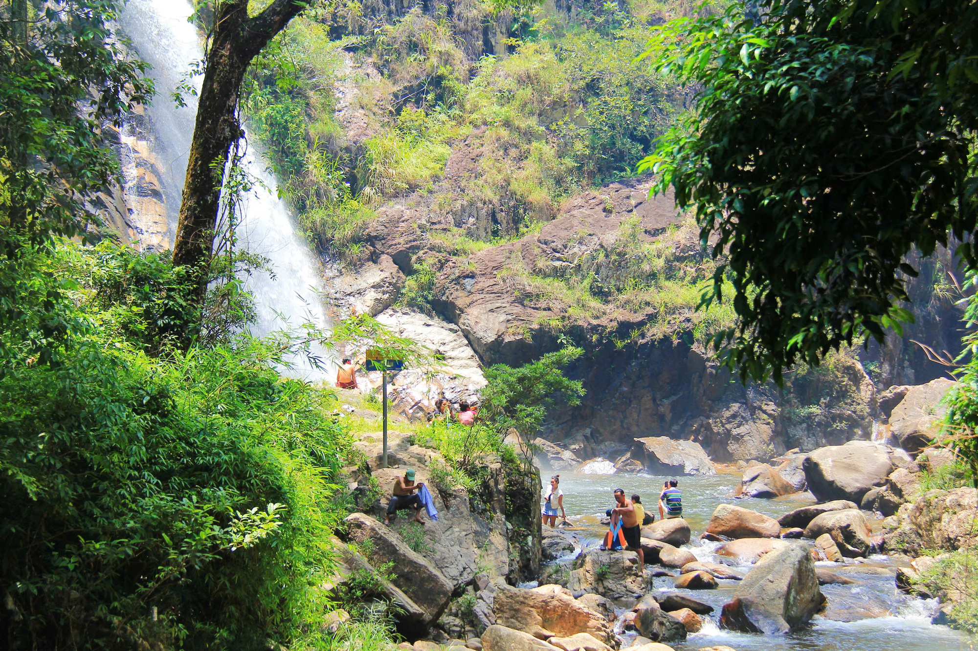 Visitors take a bath at Ta Gu Waterfall in Khanh Son District, Khanh Hoa Province, south-central Vietnam. Photo: Tran Hoai / Tuoi Tre