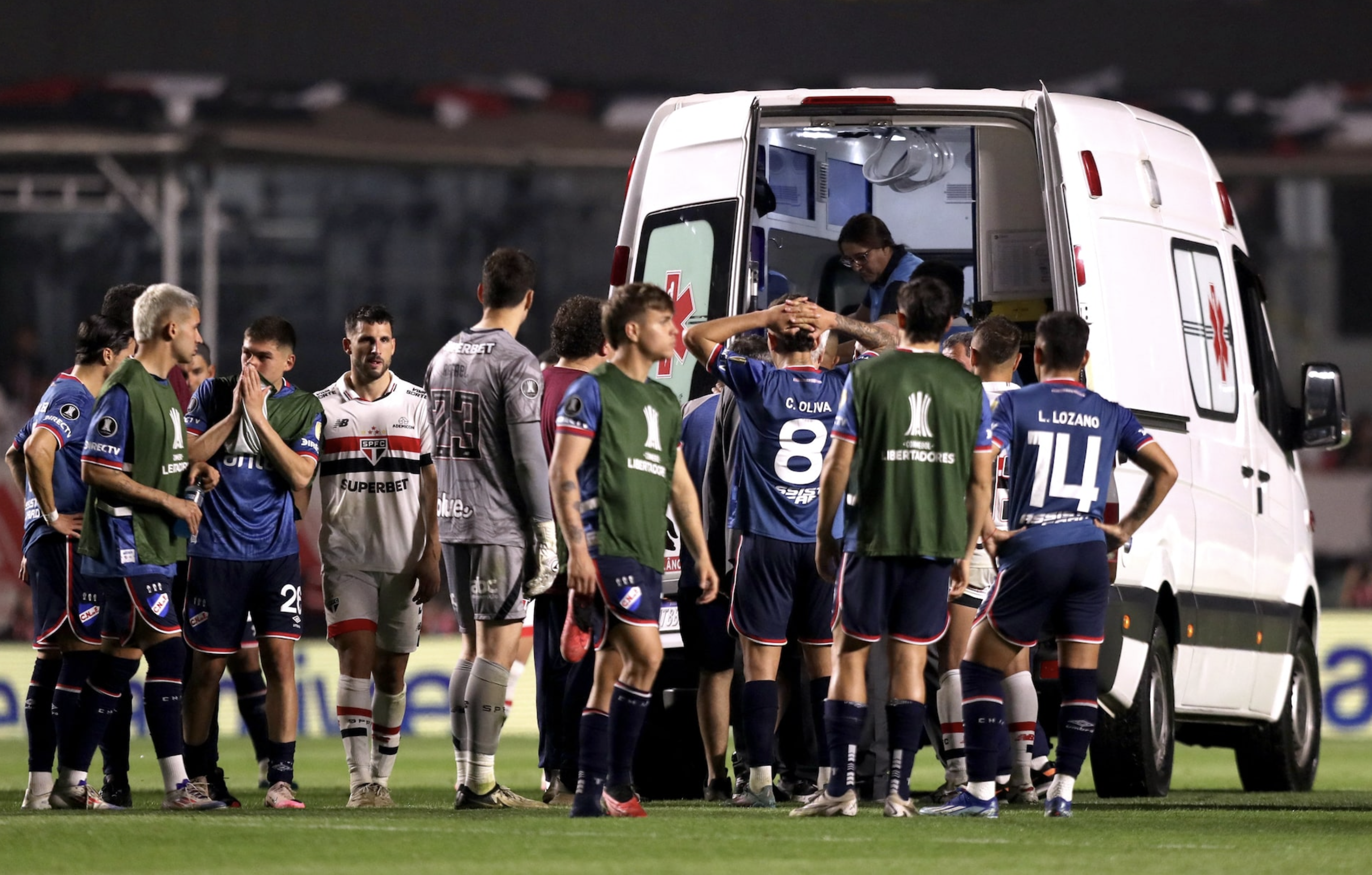 Soccer Football - Copa Libertadores - Round of 16 - Second Leg - Sao Paulo v Nacional - Estadio Morumbi, Sao Paulo, Brazil - August 22, 2024 Nacional's Juan Izquierdo is taken off the pitch after sustaining an injury. Photo: Reuters