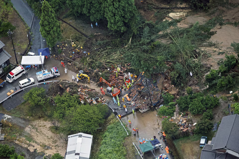 An aerial view shows rescue workers conducting search and rescue operation at a landslide site caused by a heavy rain due to the approach of Typhoon Shanshan in Gamagori, Aichi Prefecture, central Japan August 28, 2024, in this photo taken by Kyodo. Photo: Reuters