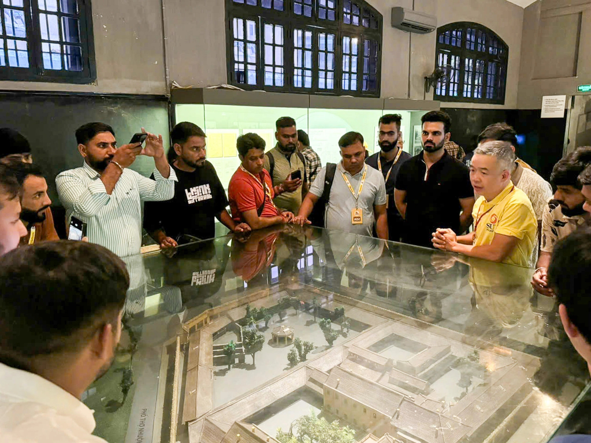 Indian visitors are briefed on historical Hoa Lo Prison in Hanoi, August 27, 2024. Photo: Vu Nam