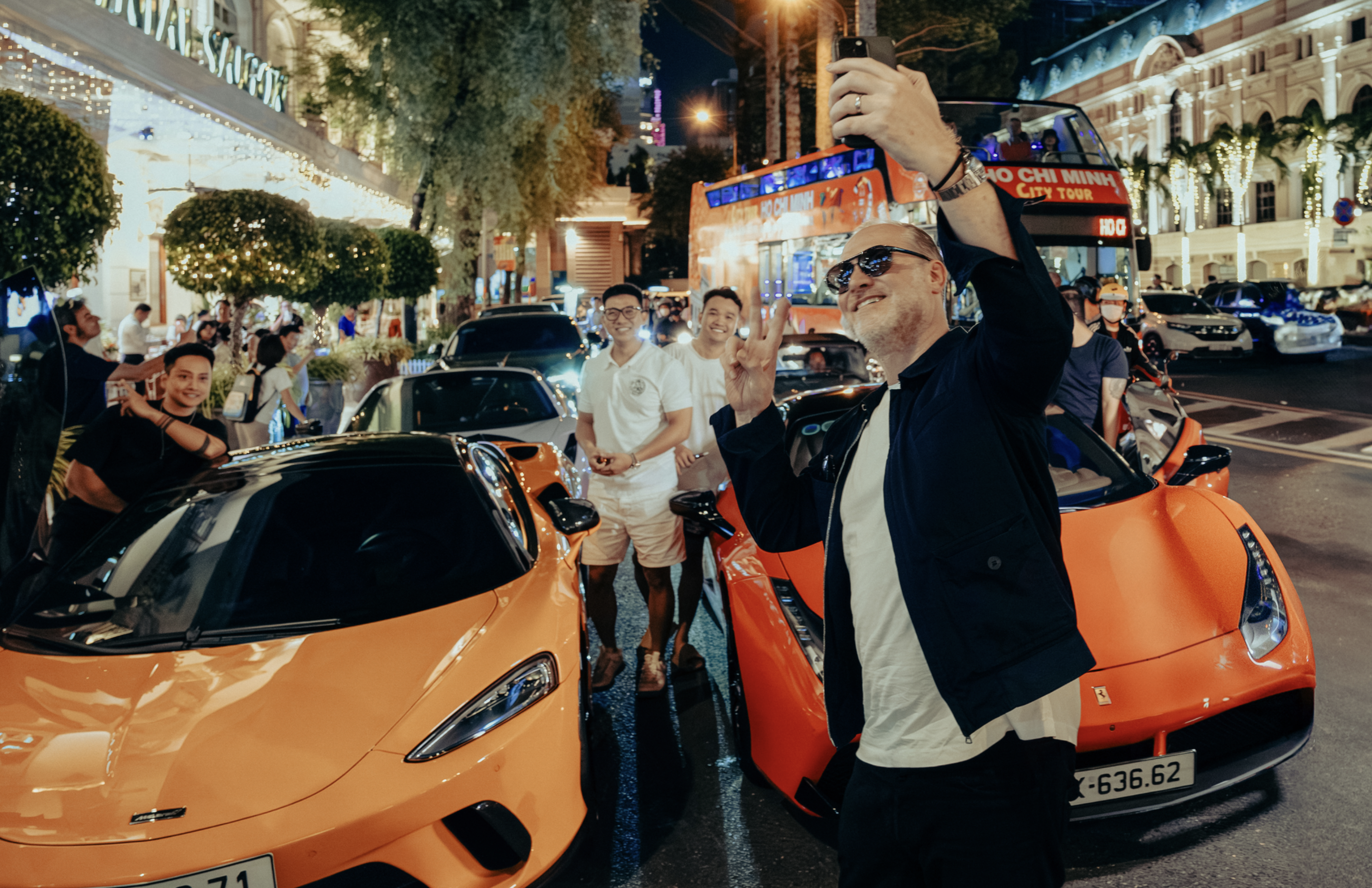 British businessman and former racecar driver Maximillion Cooper (in black), the founder of Gumball 3000, visits Ho Chi Minh City in August 2024. Photo: Gumball 3000