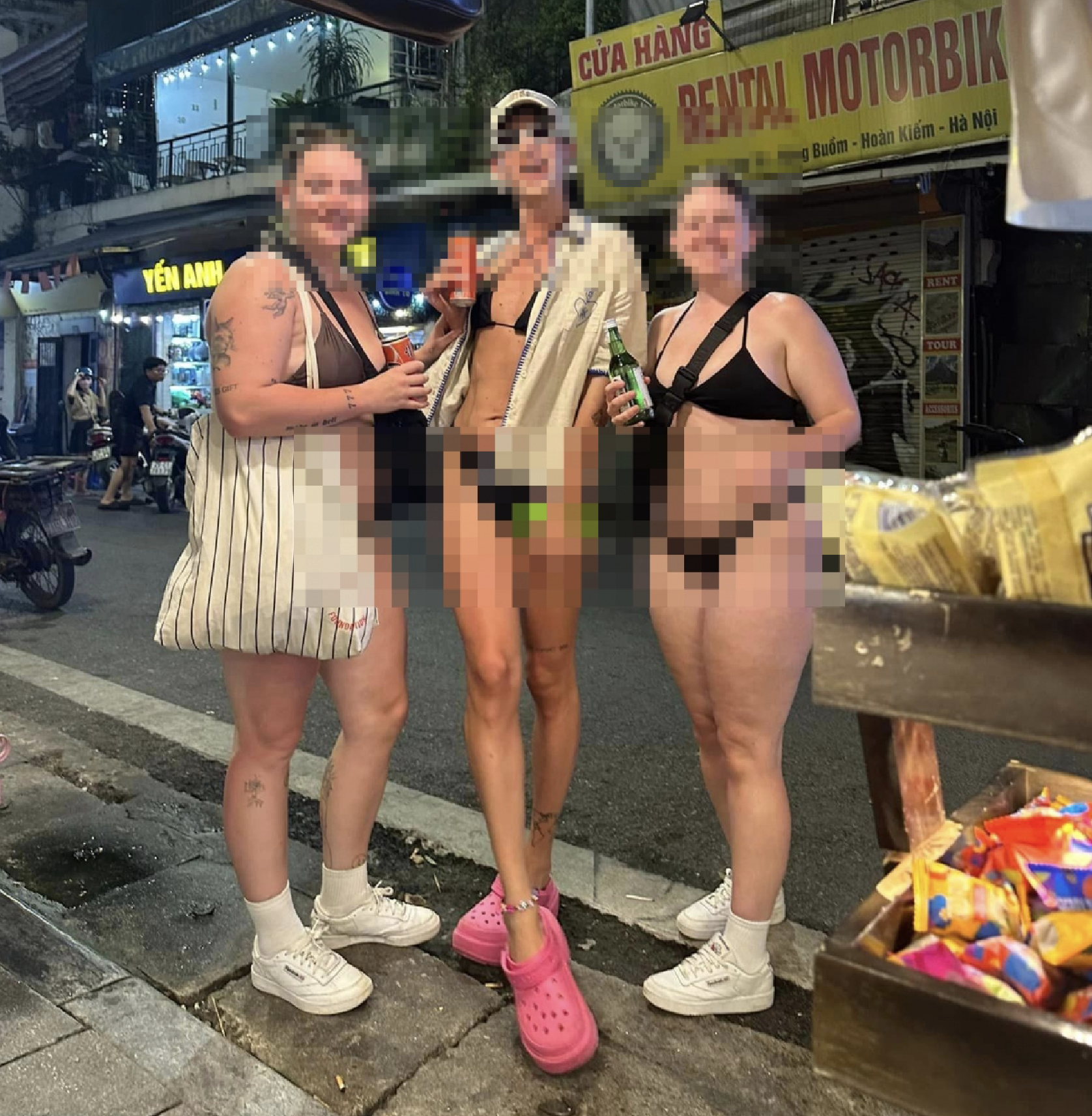 Vietnamese outraged by foreign tourists who breeze along Hanoi street in bikinis