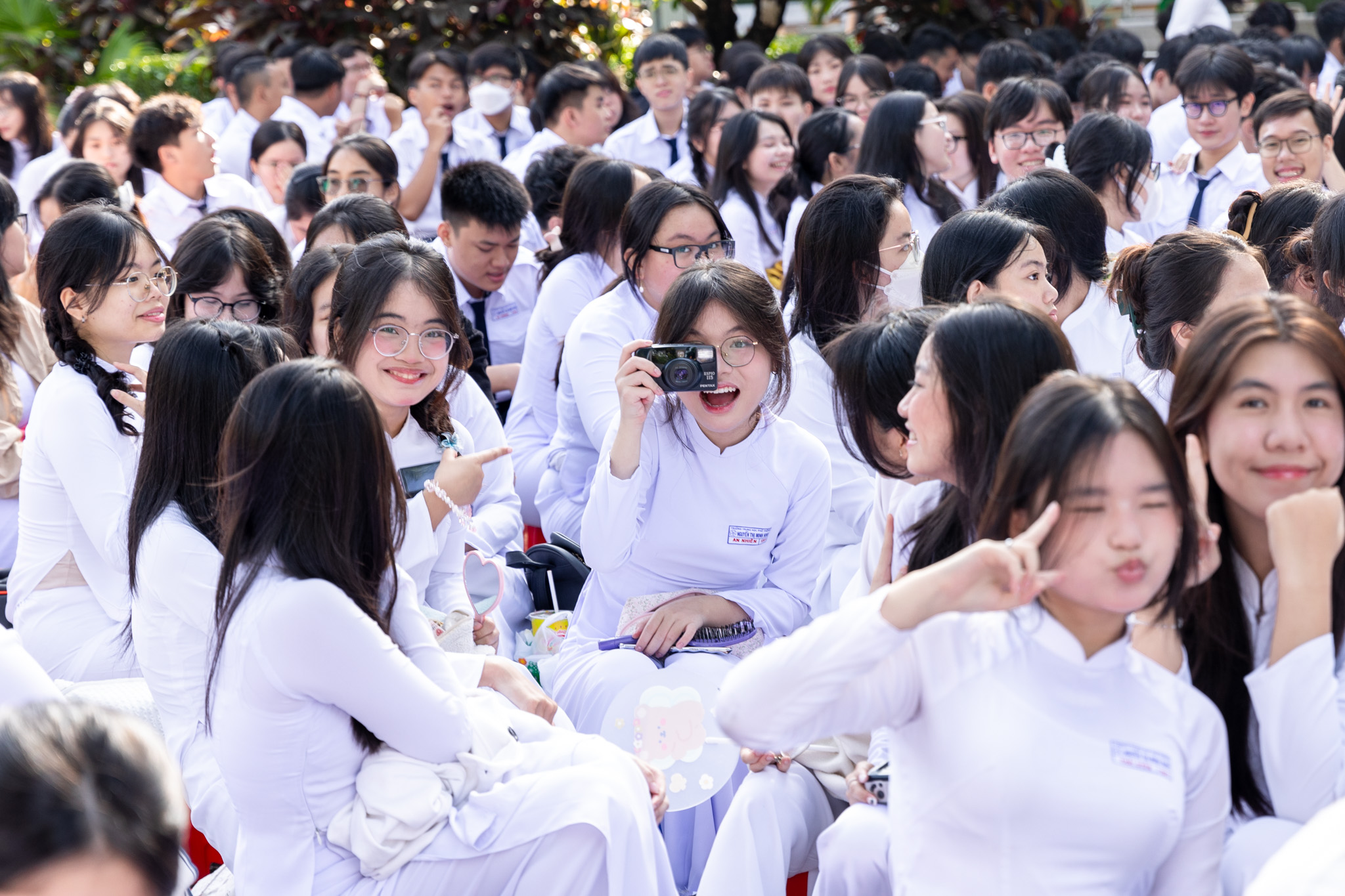 Students cheer during the new school year opening ceremony at Nguyen Thi Minh Khai High School in District 3, Ho Chi Minh City, September 5, 2024.