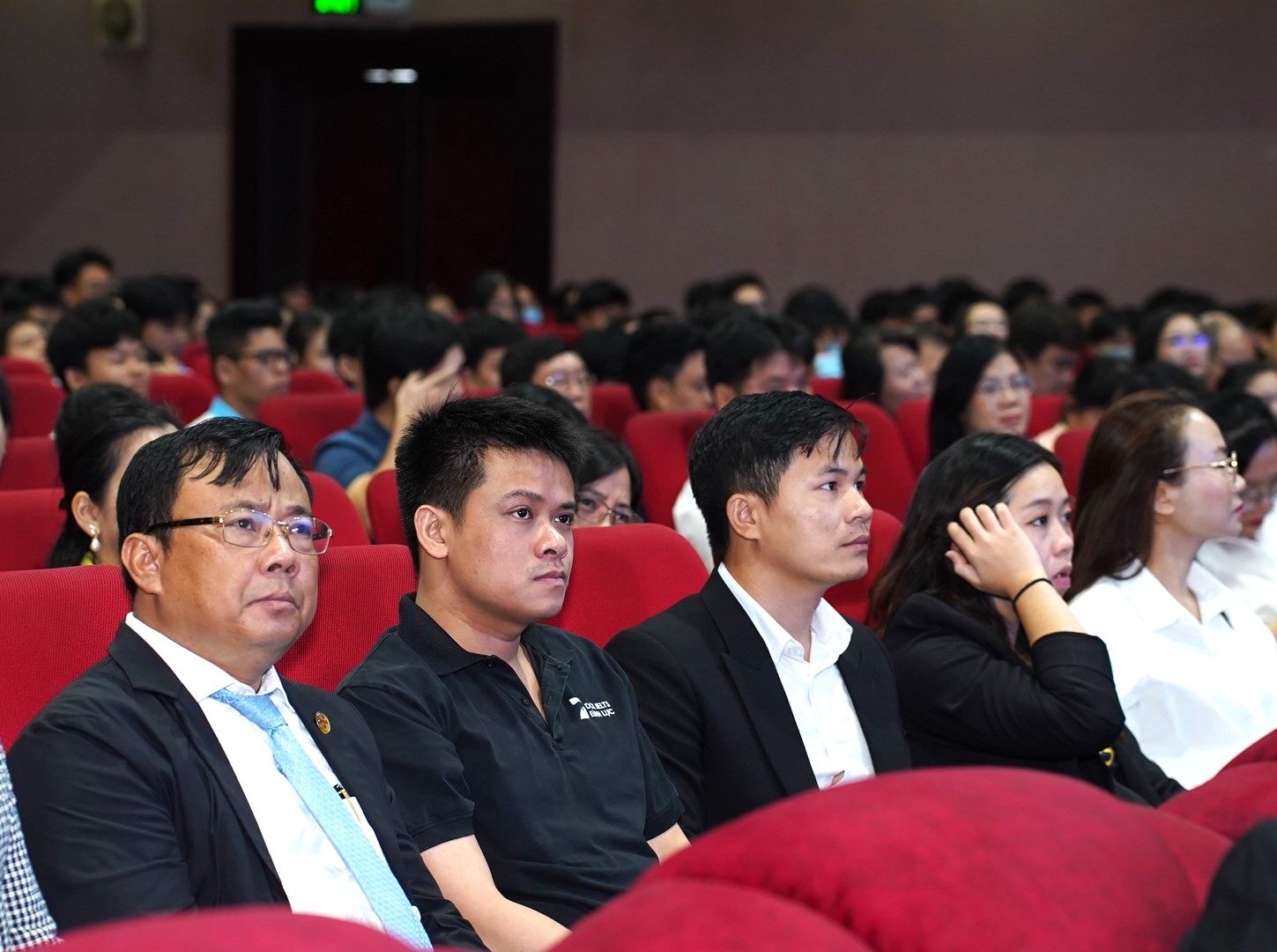 Le Dinh Luc (L, 2nd), CEO of DOL English, attends the new school year opening ceremony at the High School for Gifted Students under the Vietnam National University-Ho Chi Minh City, September 5, 2024.