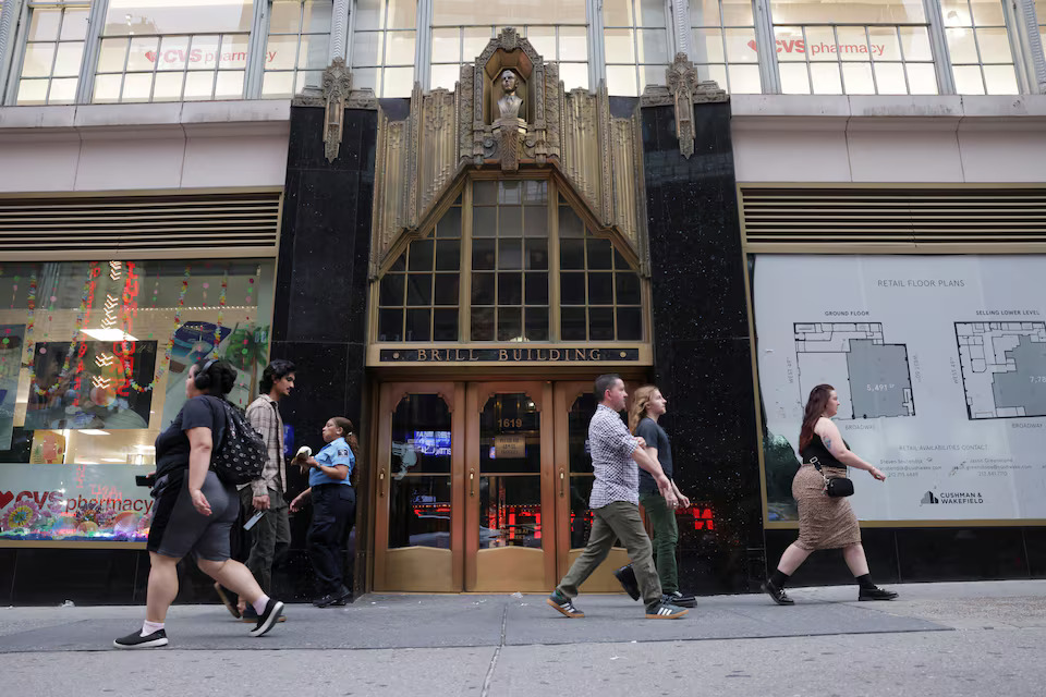 [5/6]People walk in front of the Brill Building in New York City, U.S., August 30, 2024. Photo: Reuters