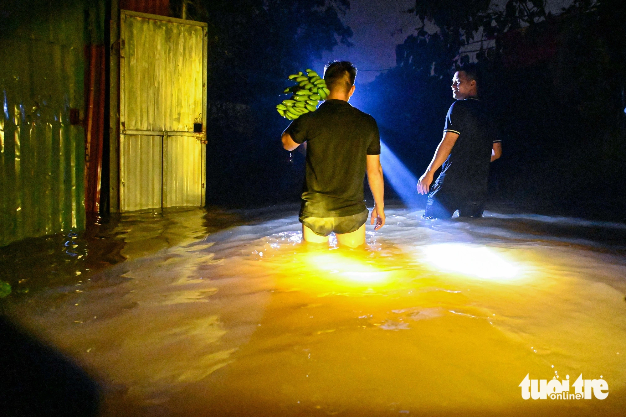 Workers leave their workshop in Hanoi. Photo: Hong Quang / Tuoi Tre