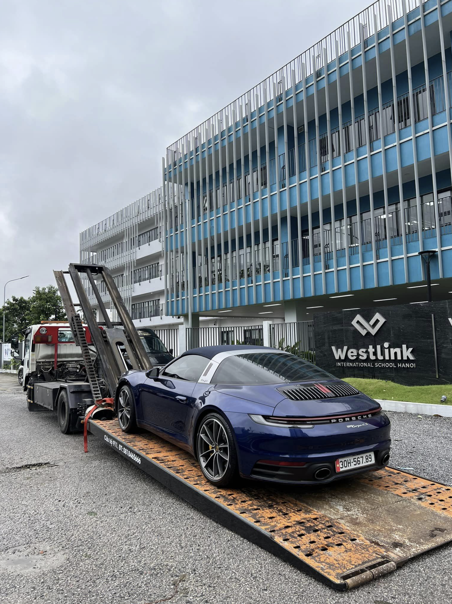 Supercars transported to higher ground amid severe flooding in Hanoi