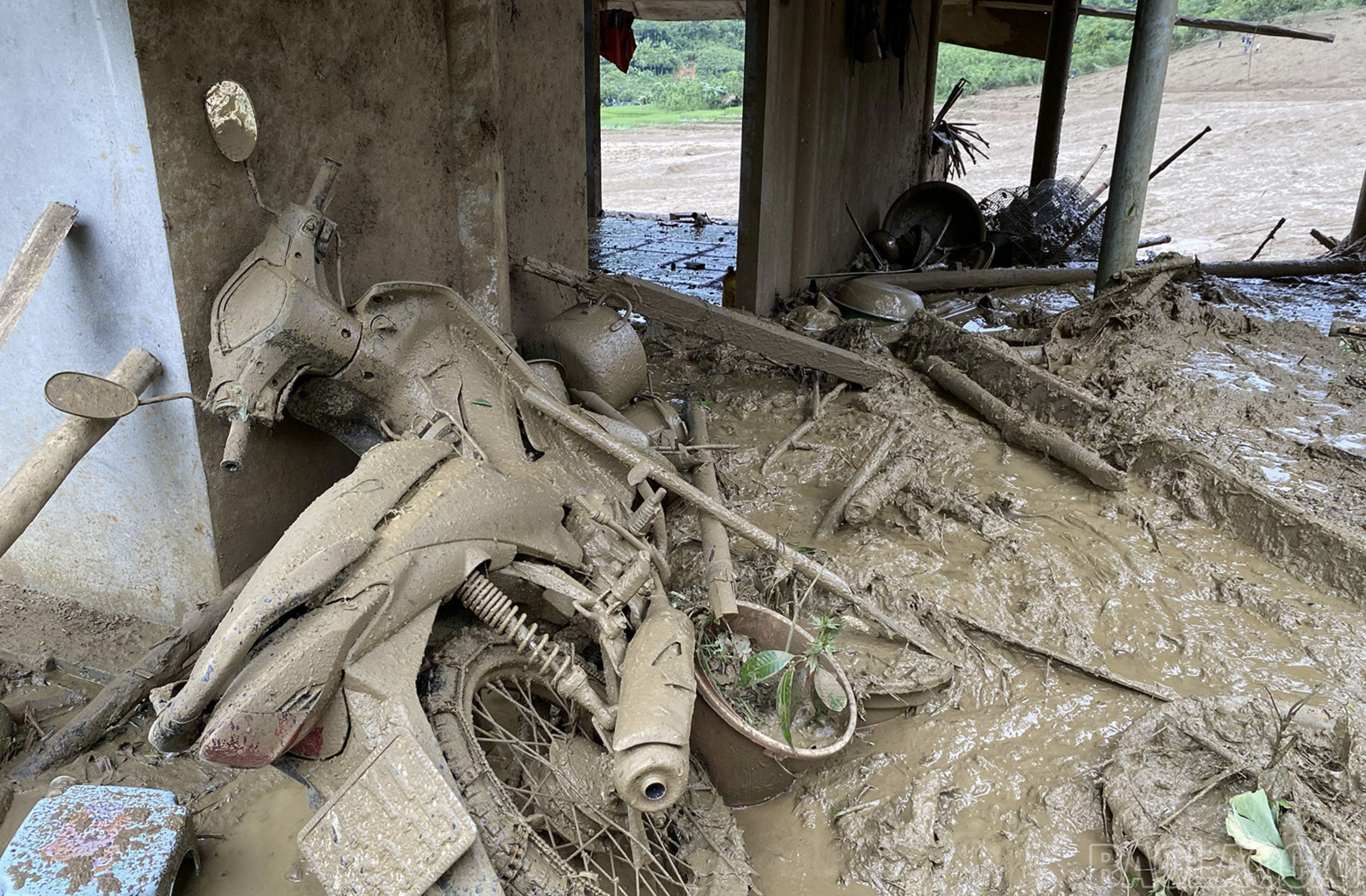 A section of a house is soaked in mud after a flash flood hits a village in Lao Cai Province. Photo: Lao Cai Newspaper