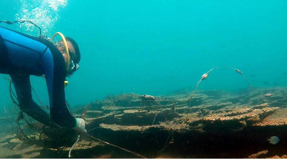 A long fishing net covers a coral reef off Con Dao Island, Ba Ria - Vung Tau Province. Photo: Supplied