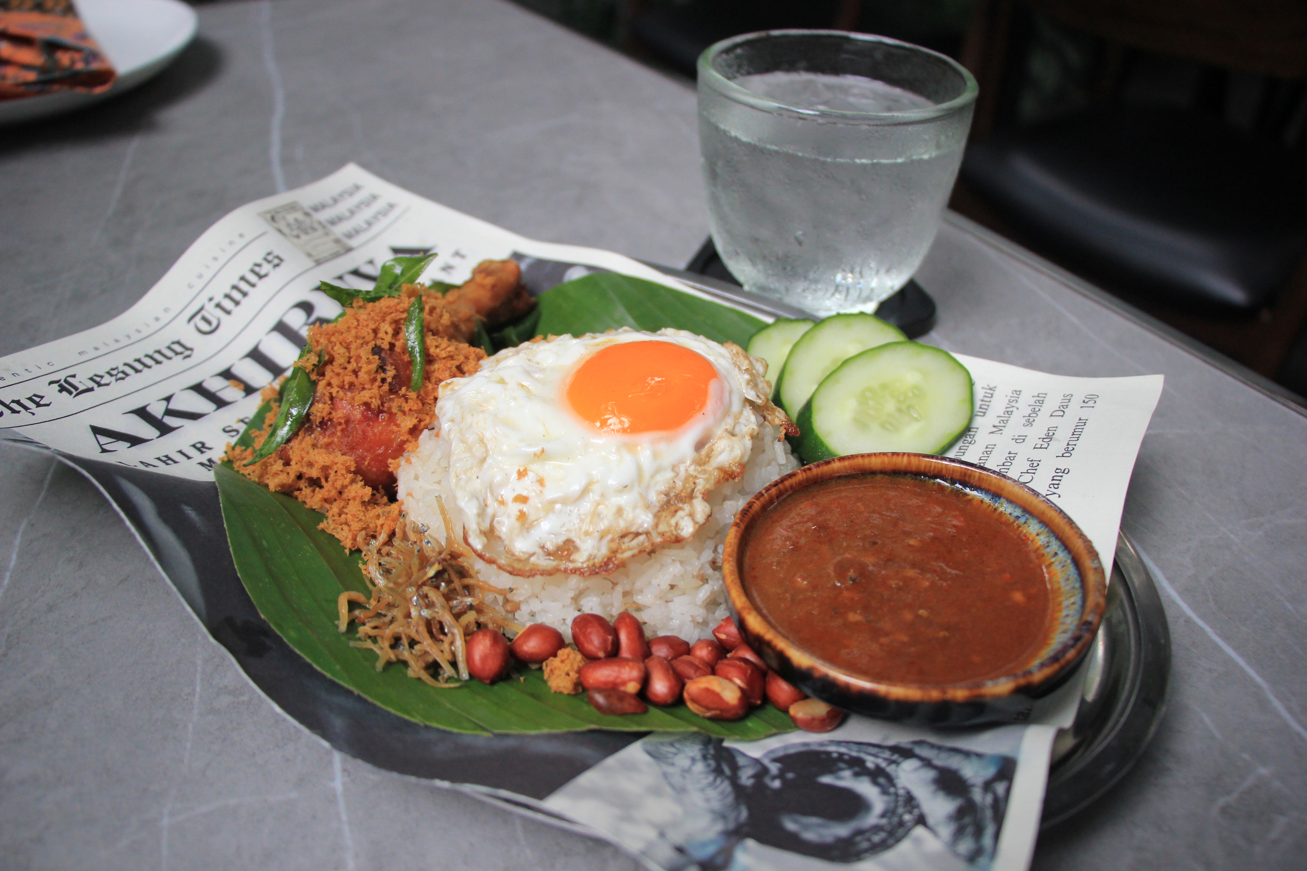 'Nasi lemak' is served at Malaysian authentic restaurant Lesung in District 3, Ho Chi Minh City. Photo: Dong Nguyen / Tuoi Tre News