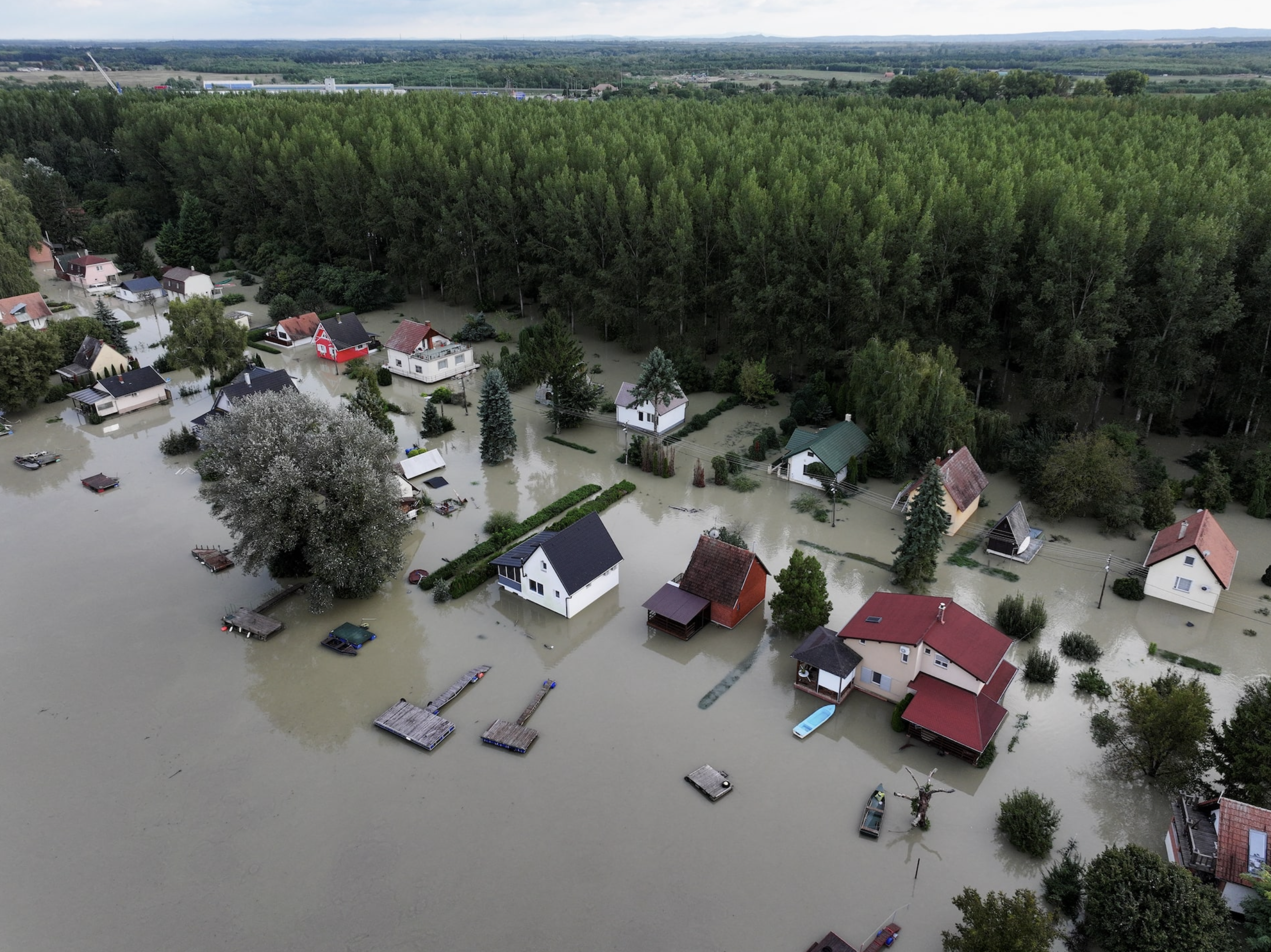 Central European floods leave trail of devastation; new areas to evacuate