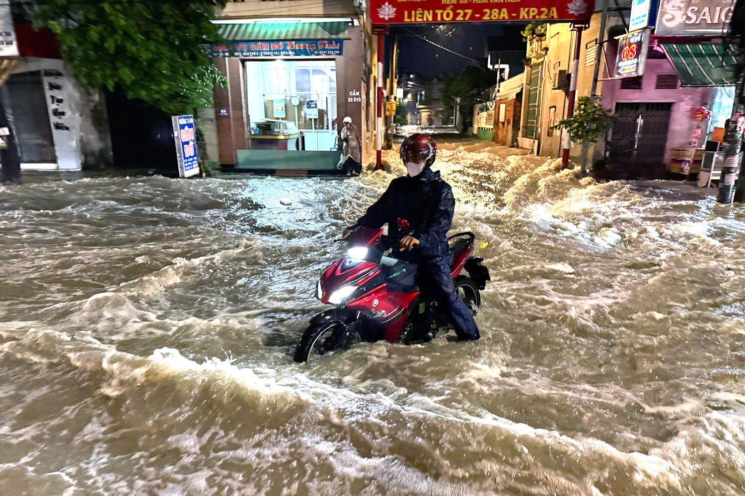 Flood-prone city street in Vietnam’s Dong Nai swamped after hour-long downpour