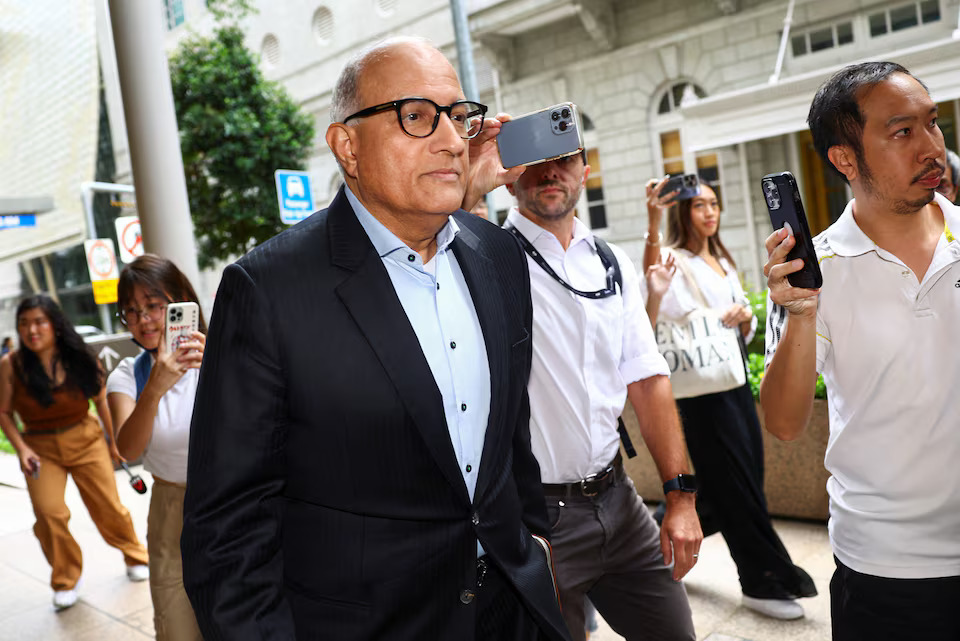 [3/4]Former transport minister S. Iswaran walks as he appears at the Supreme Court in Singapore October 3, 2024. Photo: Reuters