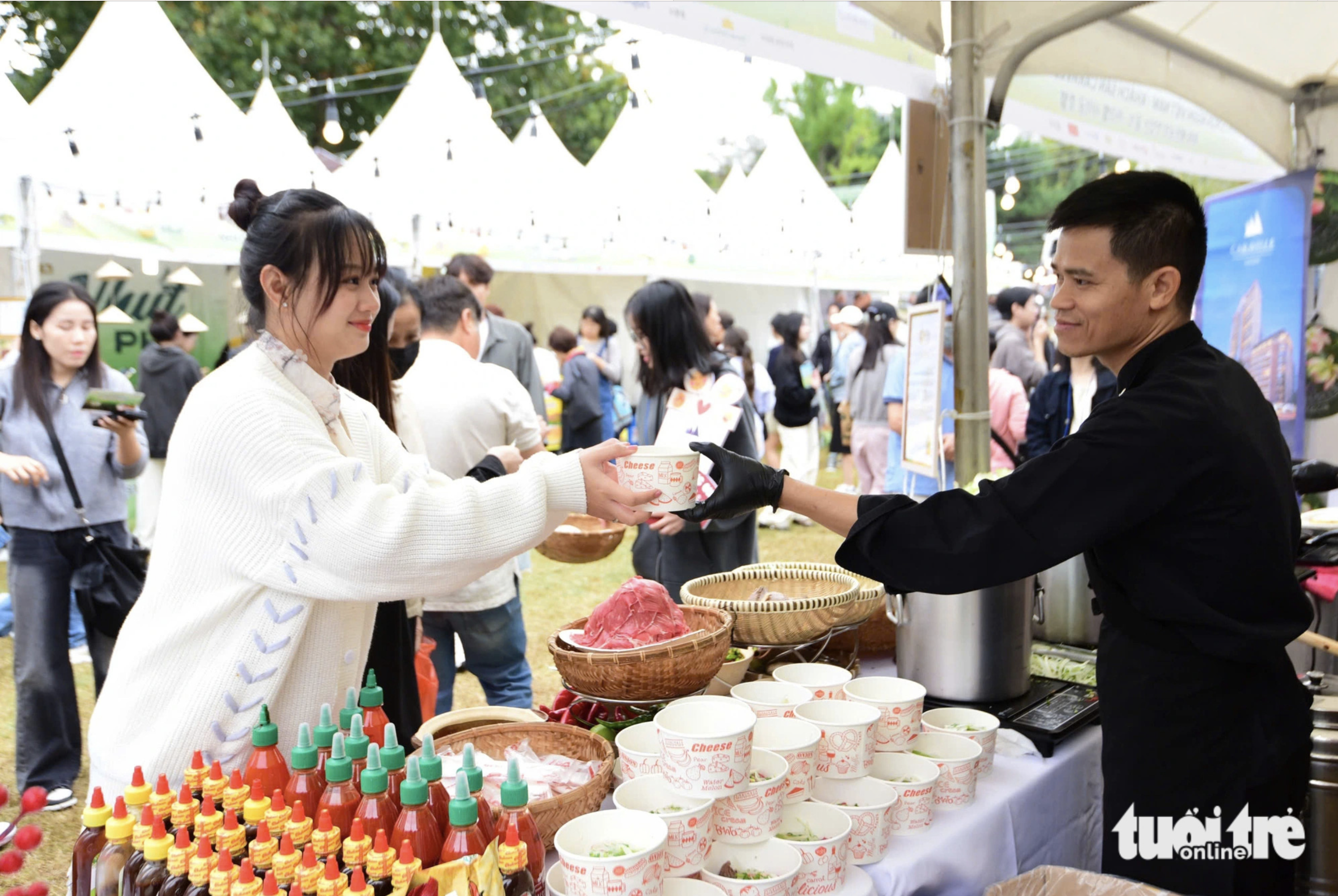 The stalls at the Vietnam Phở Festival 2024 in Seoul beef up servings as the number of visitors surges on the second day of the event on October 6, 2024