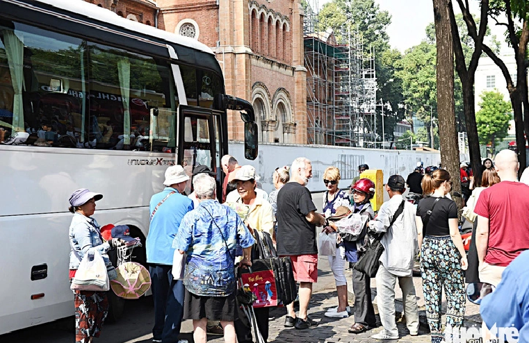 Peddlers attach to tourists upon exiting tour vehicles and don't relent until they leave the Saigon Central Post Office in downtown Ho Chi Minh City.