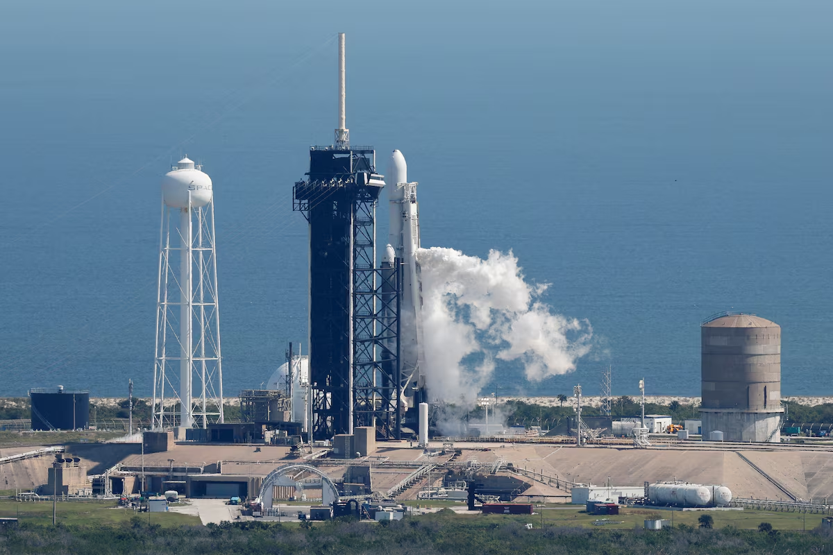 A SpaceX Falcon Heavy rocket is prepared to be launched for the Europa Clipper mission to study one of Jupiter's 95 moons, at Kennedy Space Center in Cape Canaveral, Florida, U.S. October 14, 2024. Photo: Reuters