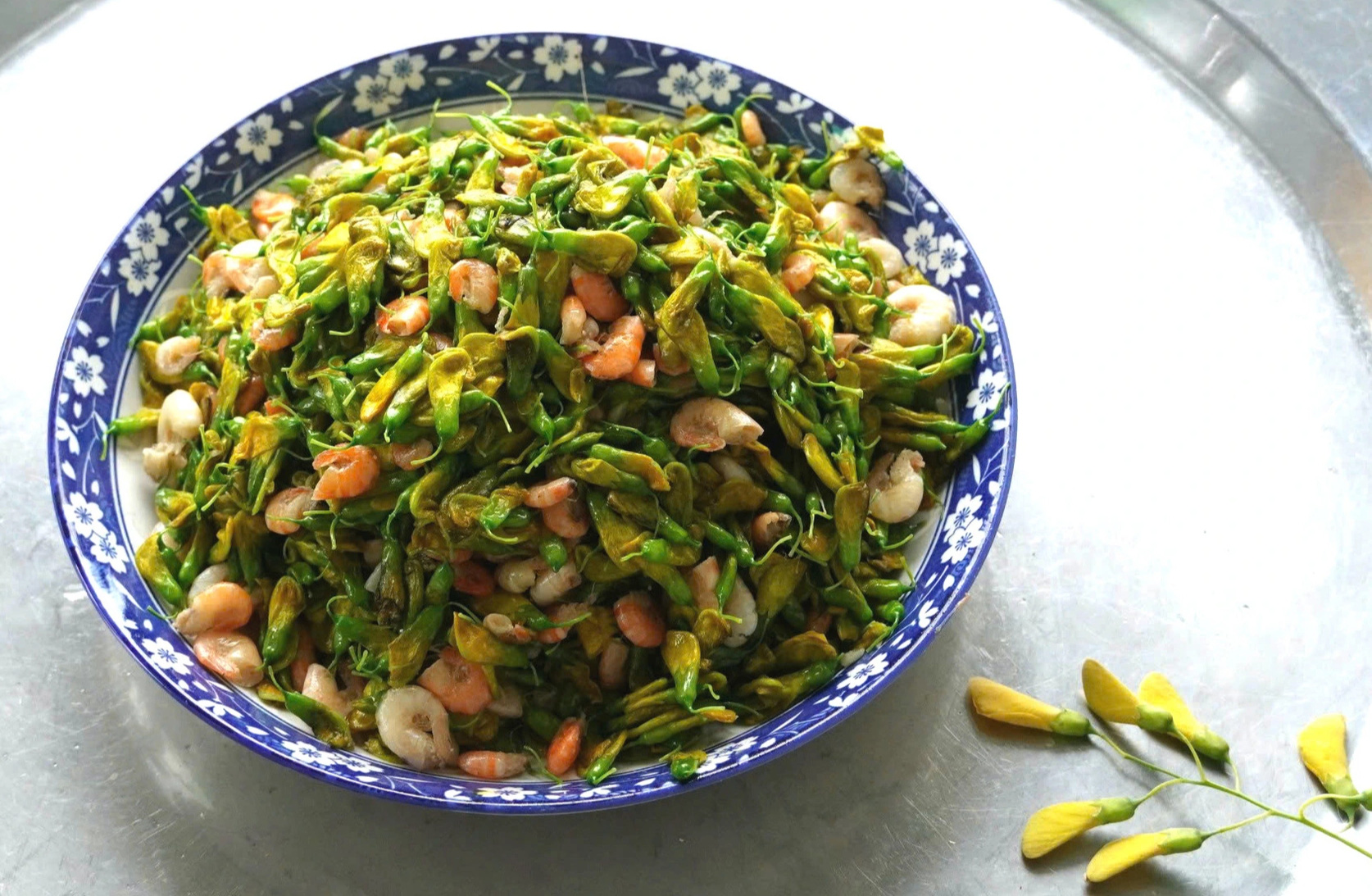 Freshwater shrimp stir-fried with sesbania sesban. Photo: Phuoc Thanh / Tuoi Tre