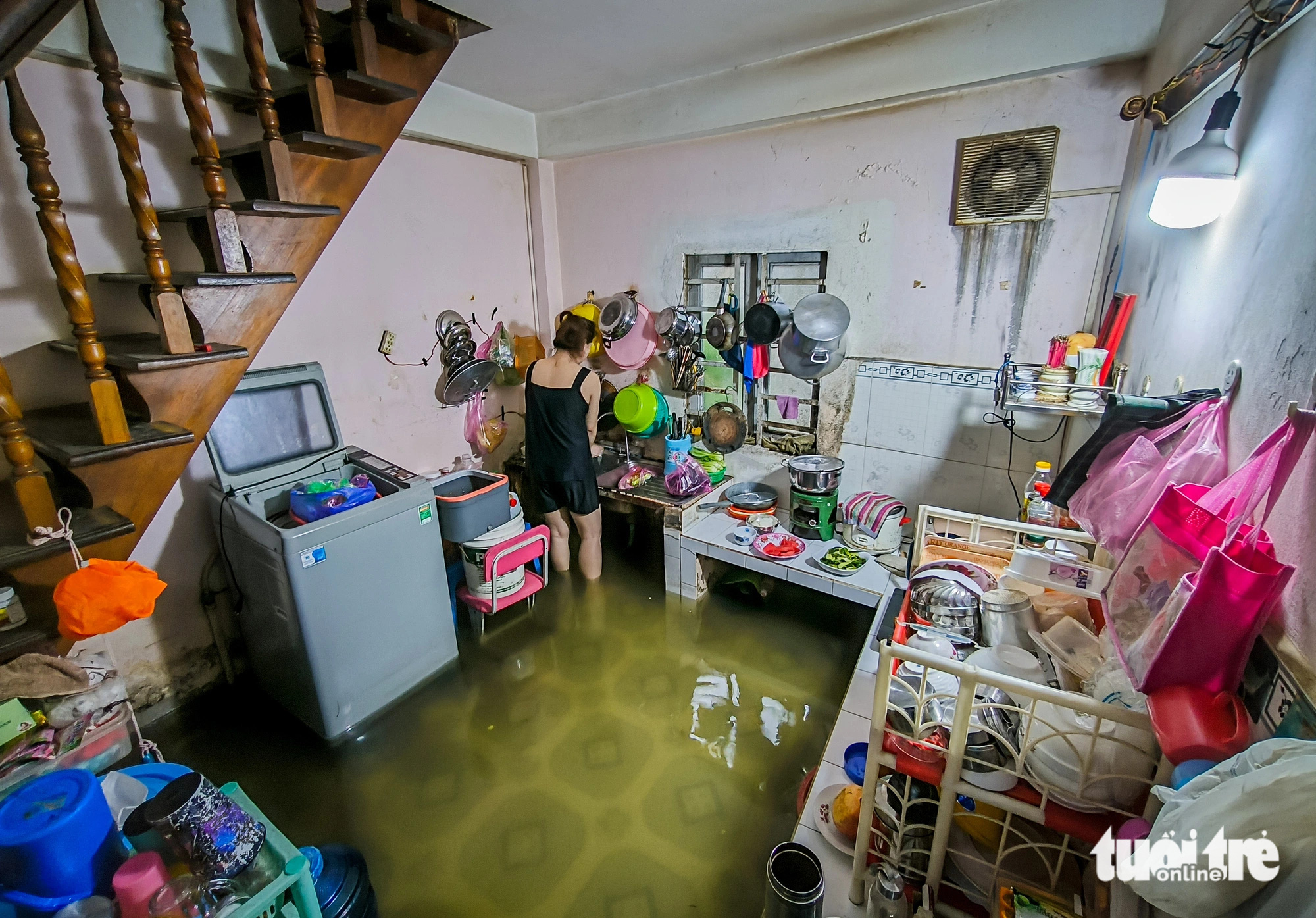 A housed down Alley 67 on Bui Van Ba Street in District 7, Ho Chi Minh City is flooded, October 18, 2024. Photo: Le Phan / Tuoi Tre