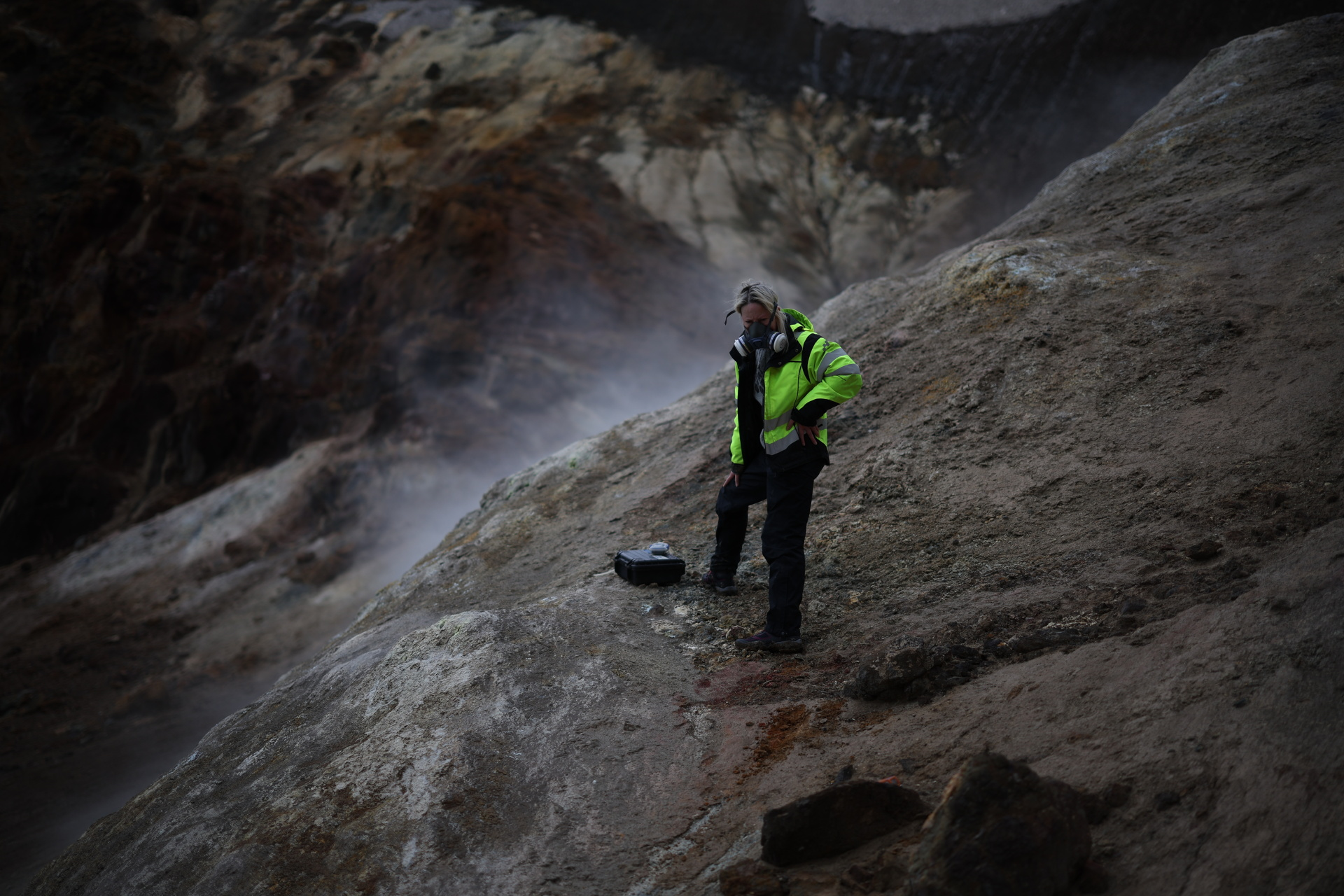 Volcanologist Michelle Parks takes readings of the gases seeping out of vents in Viti crater. Photo: Reuters