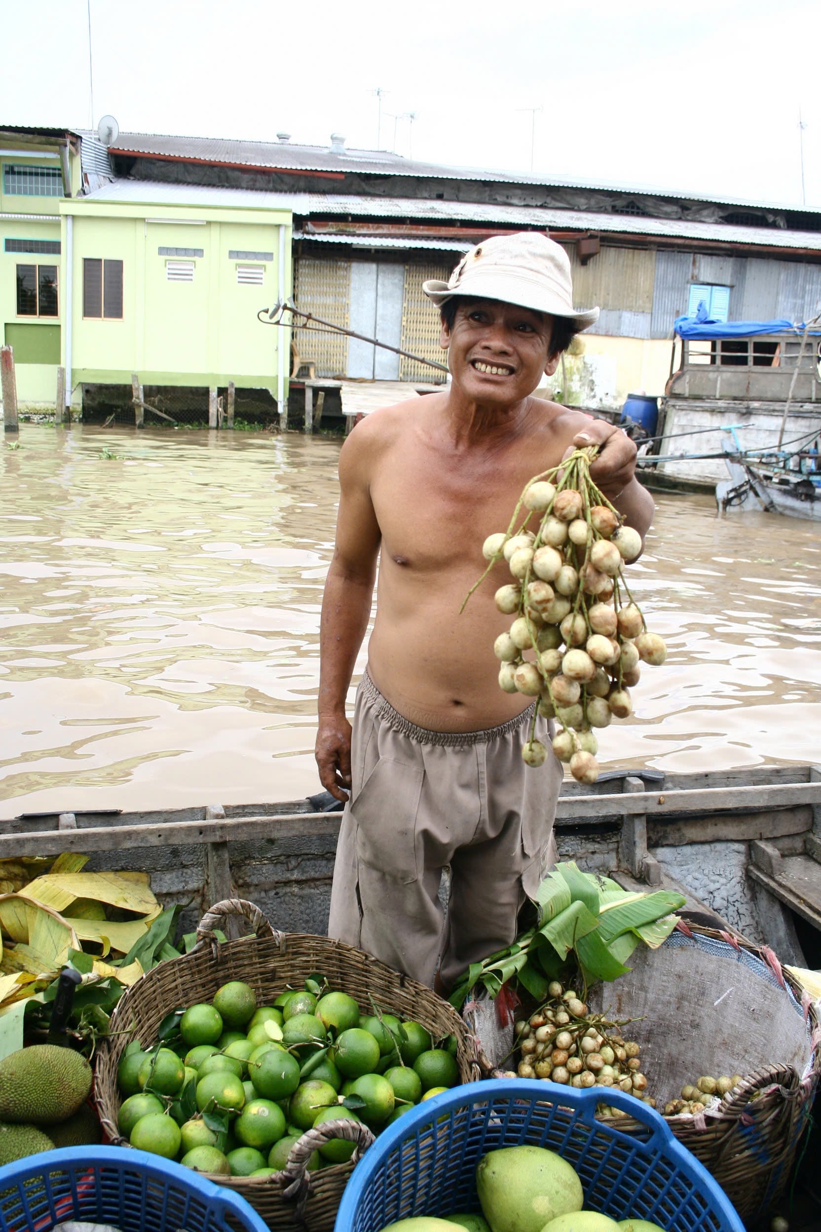 A farmer brings a selection of fruits to sell to traders.