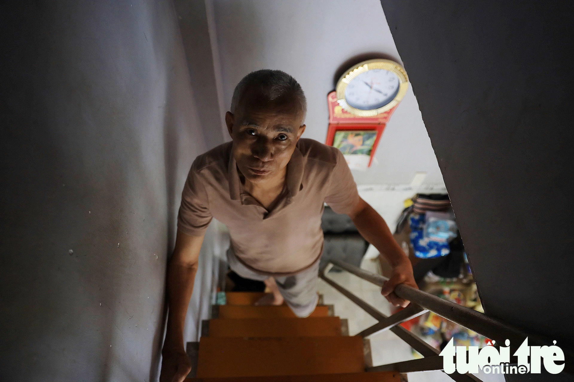 The narrow staircase inside Le’s house.