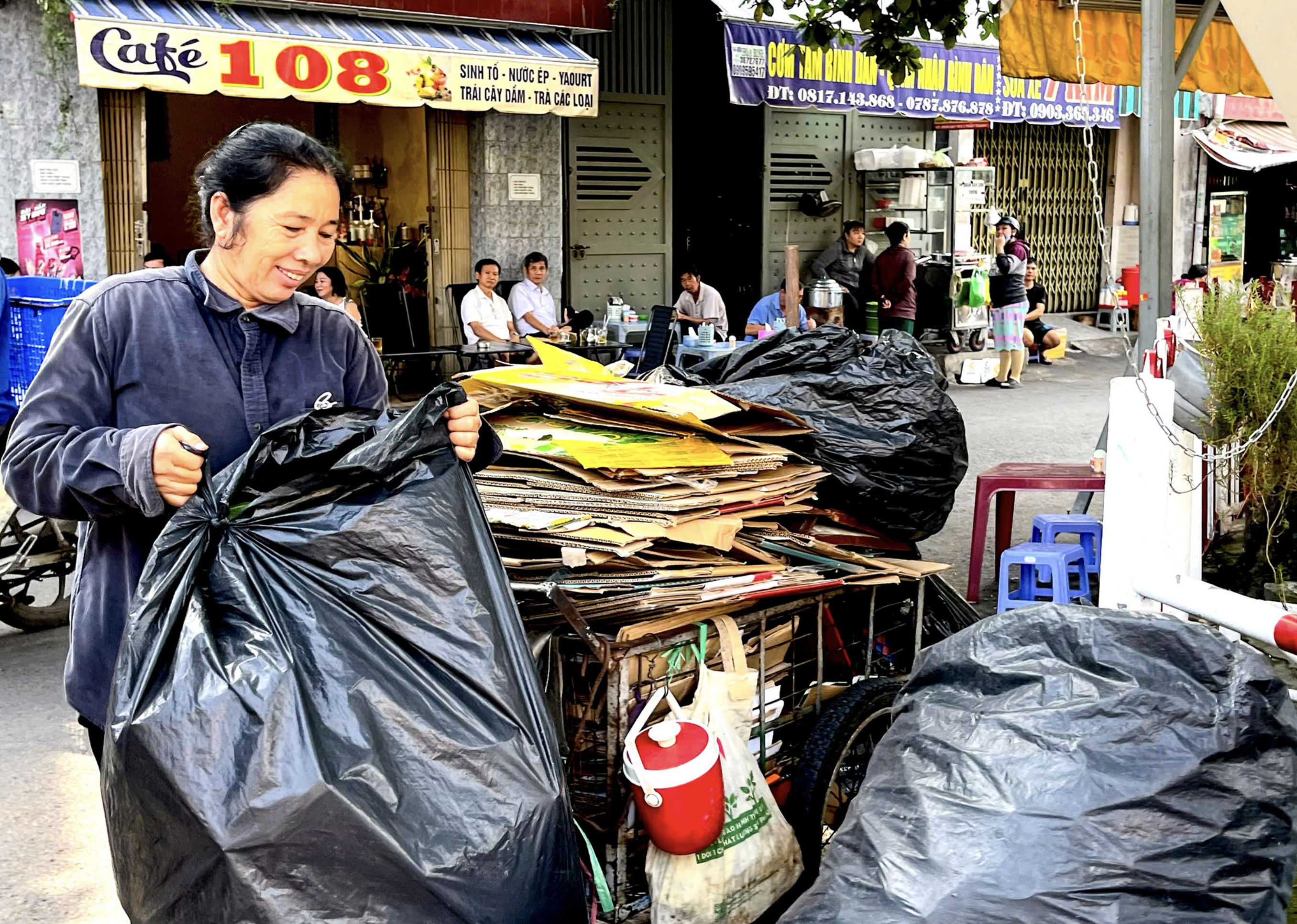 Hoa, 64, collects plastic bottles and paper in the trackside village in Phu Nhuan District, Ho Chi Minh City. Photo: Ngo Thi Thanh Ngan