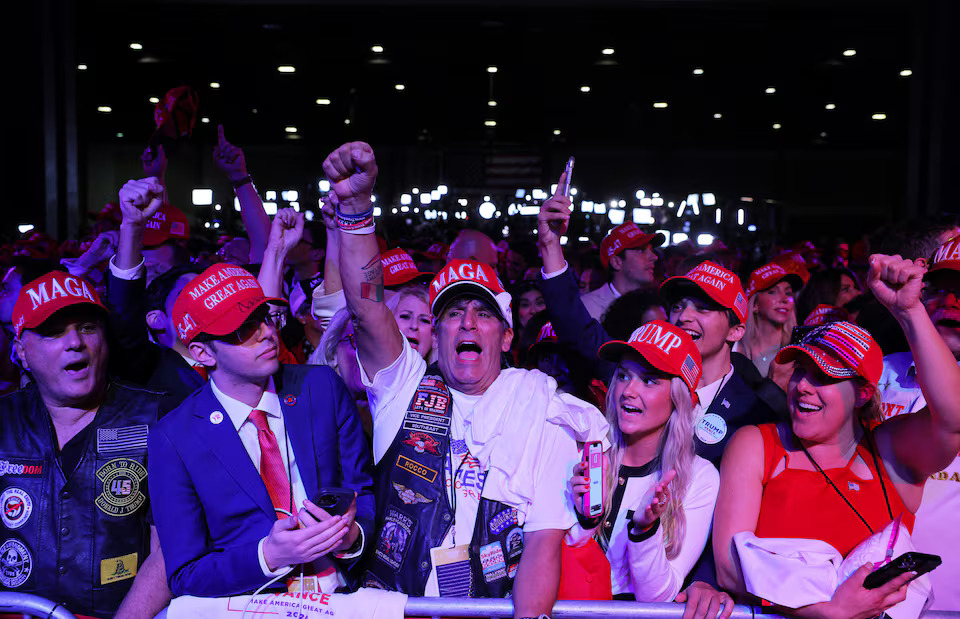 [6/6] Supporters of Donald Trump react at the Election Night rally at the Palm Beach County Convention Center in West Palm Beach, Florida. Photo: Reuters