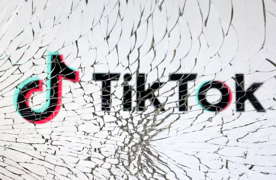 TikTok logo is seen through broken glass in this illustration taken, January 25, 2023. Photo: Reuters