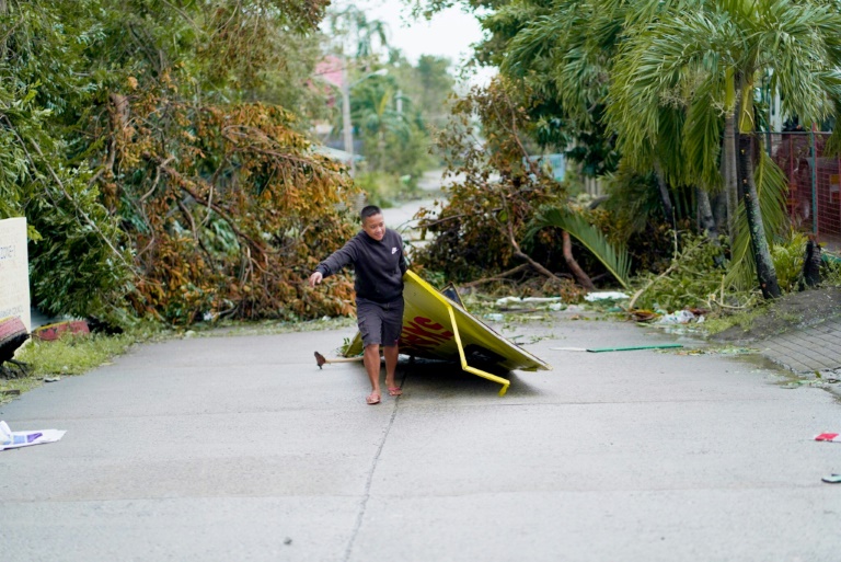 Philippines cleans up after typhoon Yinxing slams north coast