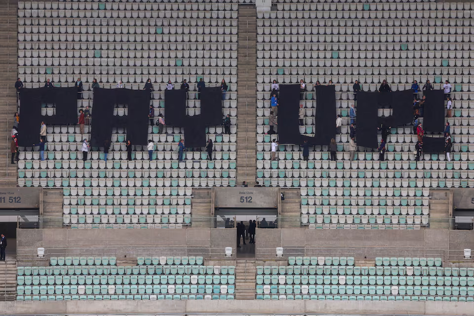 Activists hold a protest calling on developed nations to provide financing to fight climate change at the Olympic Stadium housing the United Nations climate change conference COP29 in Baku, Azerbaijan. Photo: Reuters