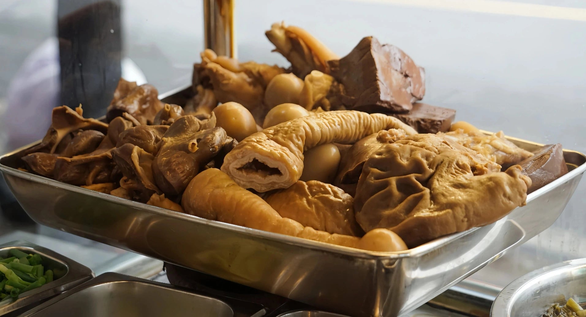 Stewed pork offal displayed on the counter at Phá Lấu Lâm Ký in District 11, Ho Chi Minh City. Photo: Le Duy / Tuoi Tre