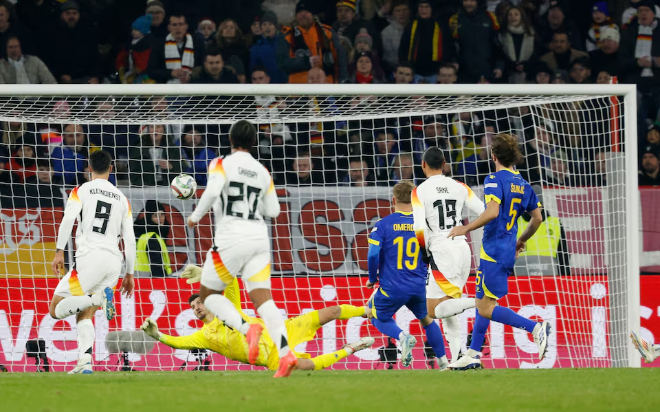 Soccer Football - Nations League - Group Stage - Germany v Bosnia and Herzegovina - Europa Park Stadion, Freiburg, Germany - November 16, 2024 Germany's Leroy Sane scores their sixth goal. Photo: Reuters