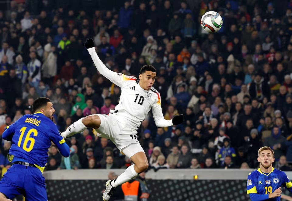 Soccer Football - Nations League - Group Stage - Germany v Bosnia and Herzegovina - Europa Park Stadion, Freiburg, Germany - November 16, 2024 Germany's Jamal Musiala scores their first goal. Photo: Reuters