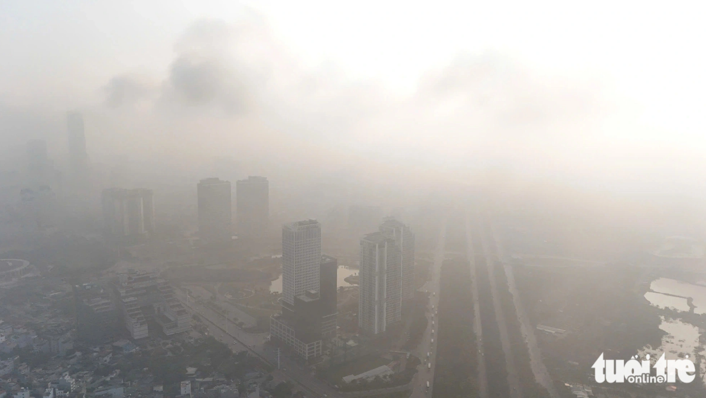 Grey haze hangs over Hanoi at midday due to poor air quality