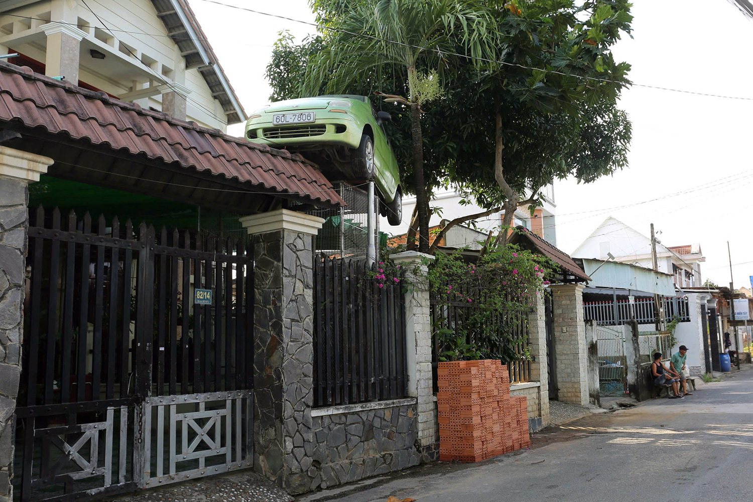 In southern Vietnam, this family's car-topped gate is a real head-turner