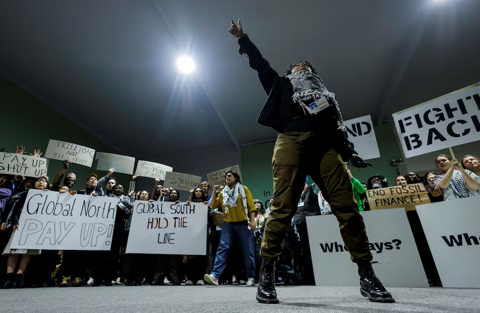 Activists shout slogans during a protest action at the COP29 United Nations climate change conference, in Baku, Azerbaijan November 23, 2024. Photo: Reuters