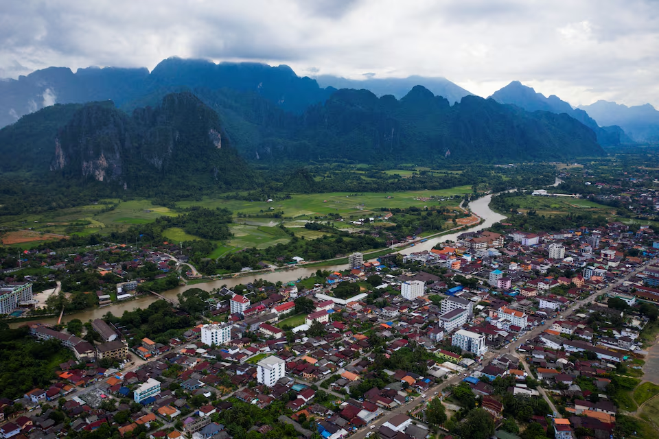 Laos vows justice after tainted alcohol kills tourists