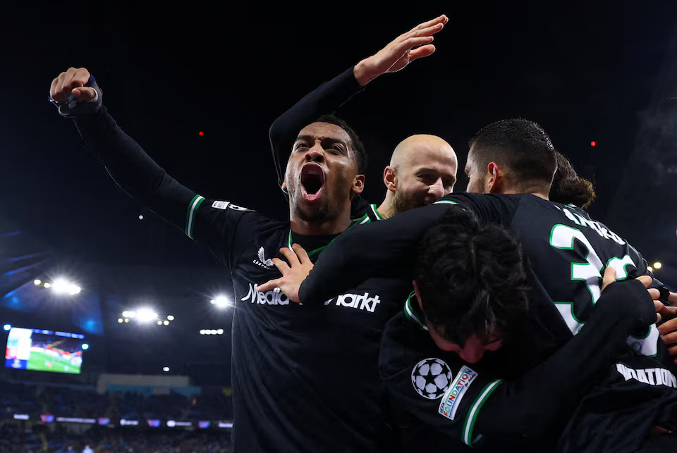 Soccer Football - Champions League - Manchester City v Feyenoord - Etihad Stadium, Manchester, Britain - November 26, 2024 Feyenoord's David Hancko celebrates scoring their third goal with Quinten Timber. Photo: Reuters