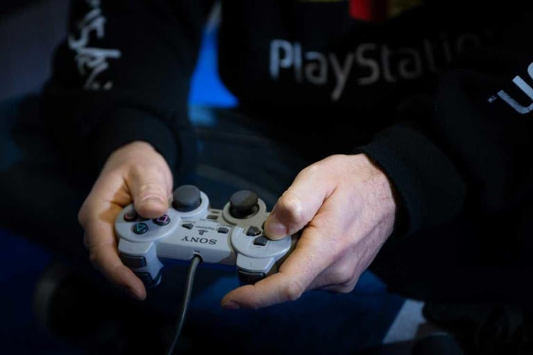 The smooth design of the PlayStation controllers set them apart from rivals. Photo: AFP