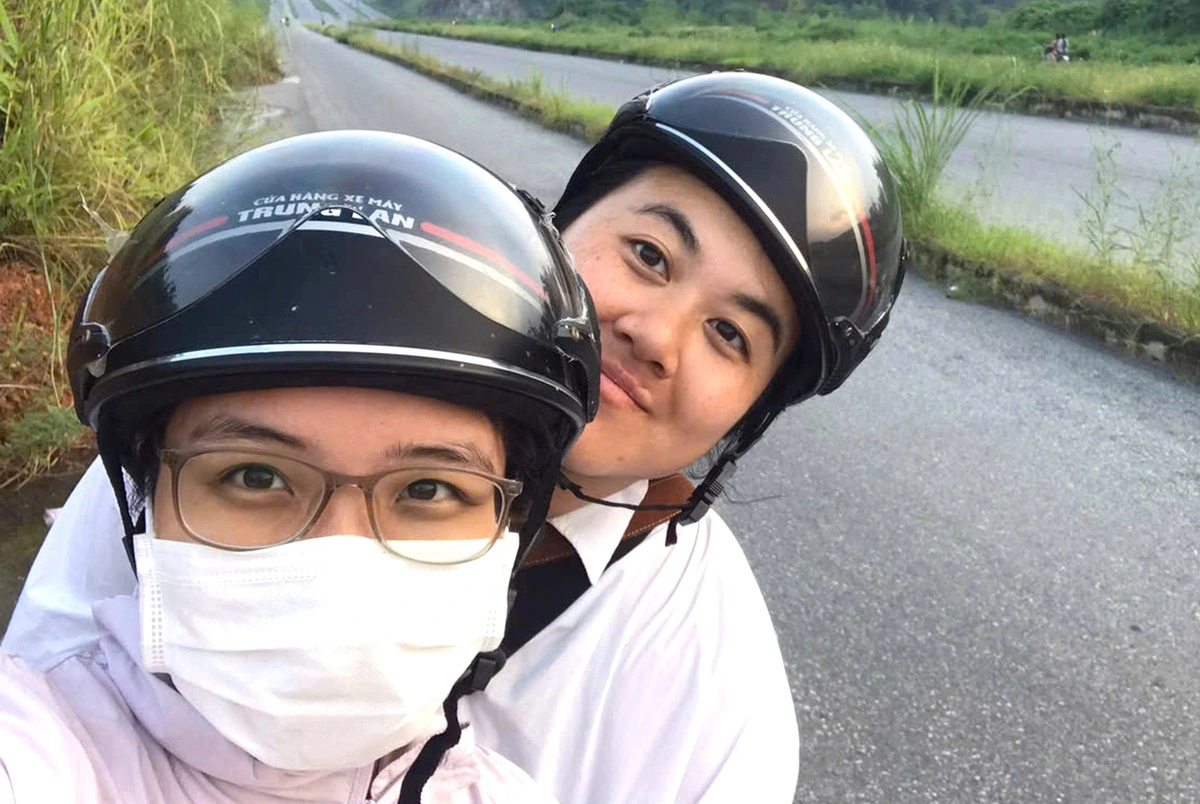 Nguyen Thi Kim Hoa (R), a young Swedish woman searching for her Vietnamese birth mother, is accompanied by her closest friend, Dinh Thu Thuy, as they visit various locations in their quest for information.