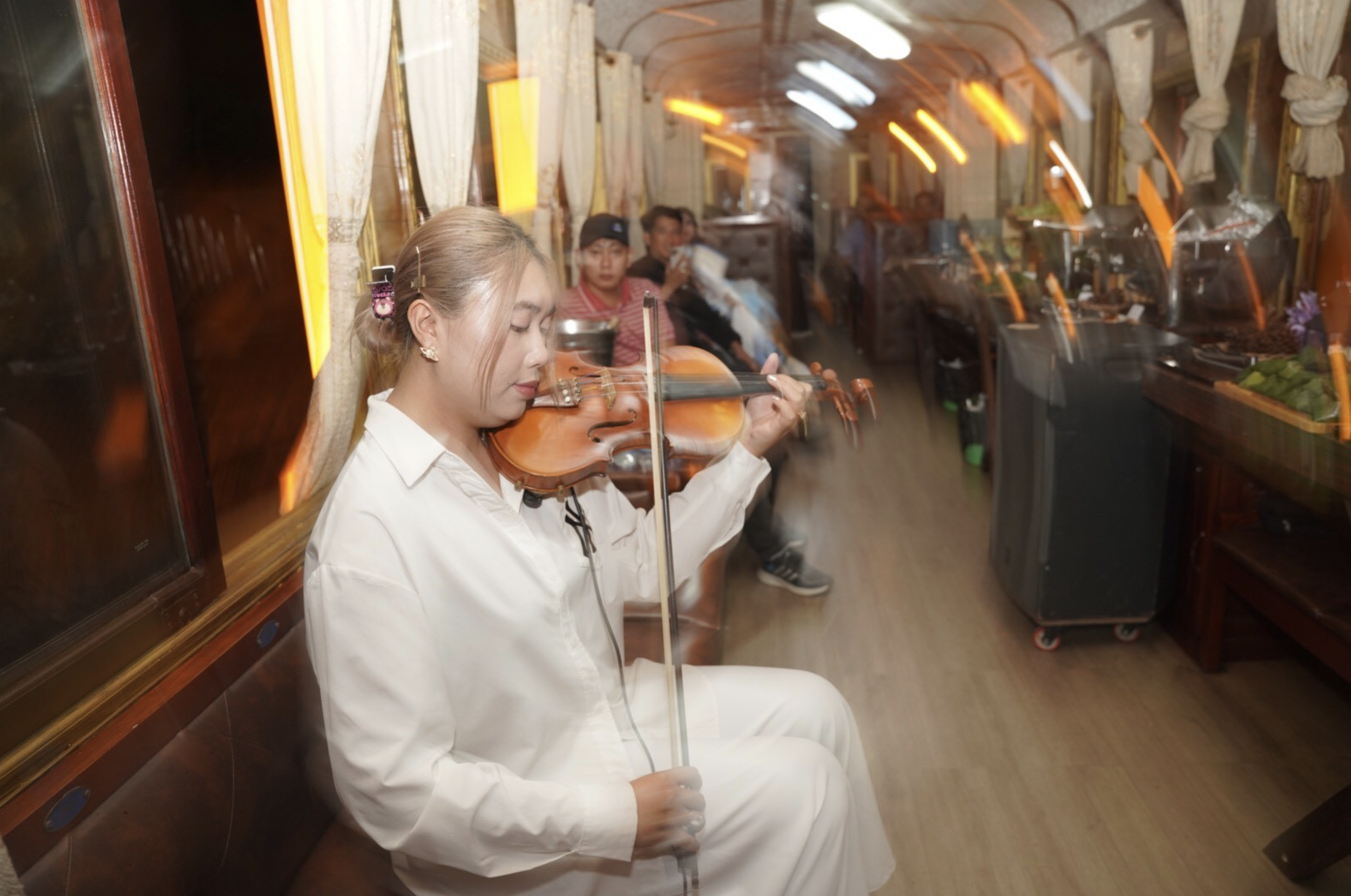 An art performance in a vintage train in Da Lat. Photo: Nam Trinh