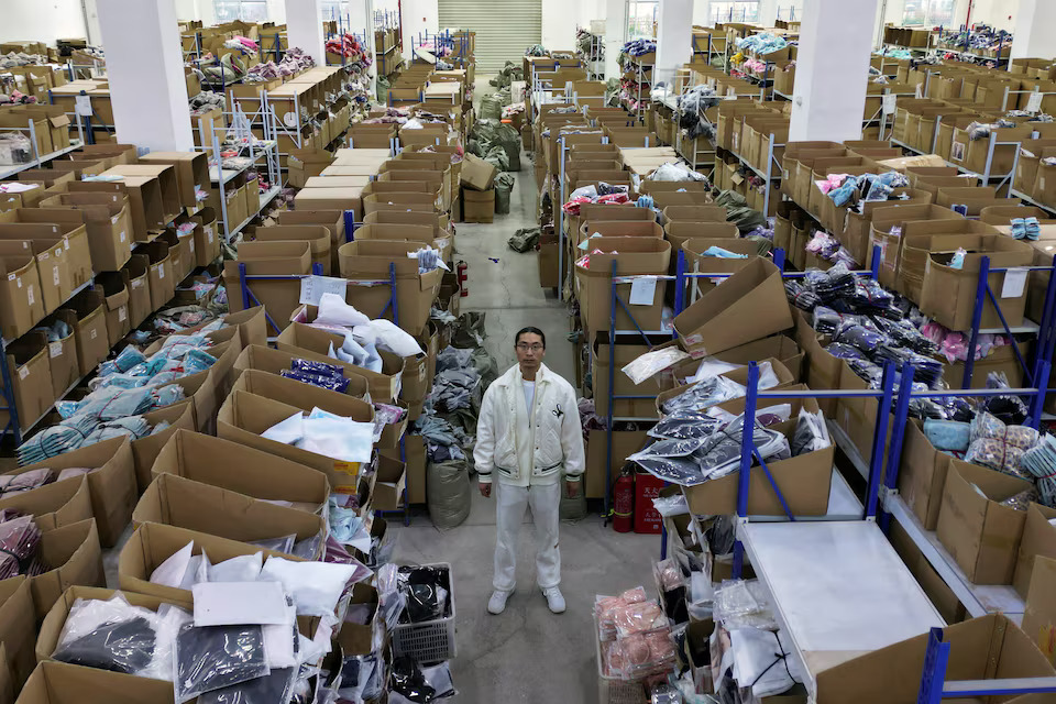 [9/10]A drone view shows Lei Congrui posing for pictures at the warehouse of his Midnight Charm Garment lingerie factory in Guanyun county of Lianyungang, Jiangsu province, China November 25, 2024. Photo: Reuters