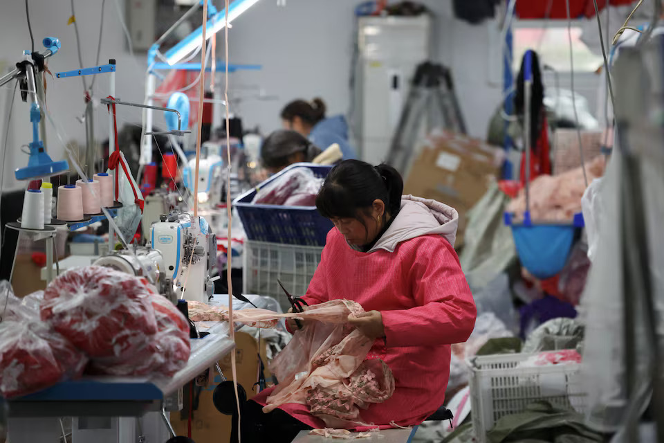 [5/10]Employees work on the production line at the Midnight Charm Garment lingerie factory in Guanyun county of Lianyungang, Jiangsu province, China November 25, 2024. Photo: Reuters