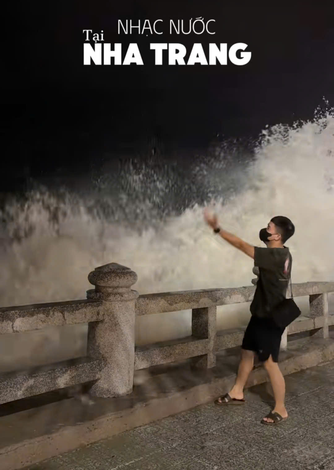 A man poses amid crashing waves in Nha Trang City, Khanh Hoa Province, south-central Vietnam. Photo: TikTok