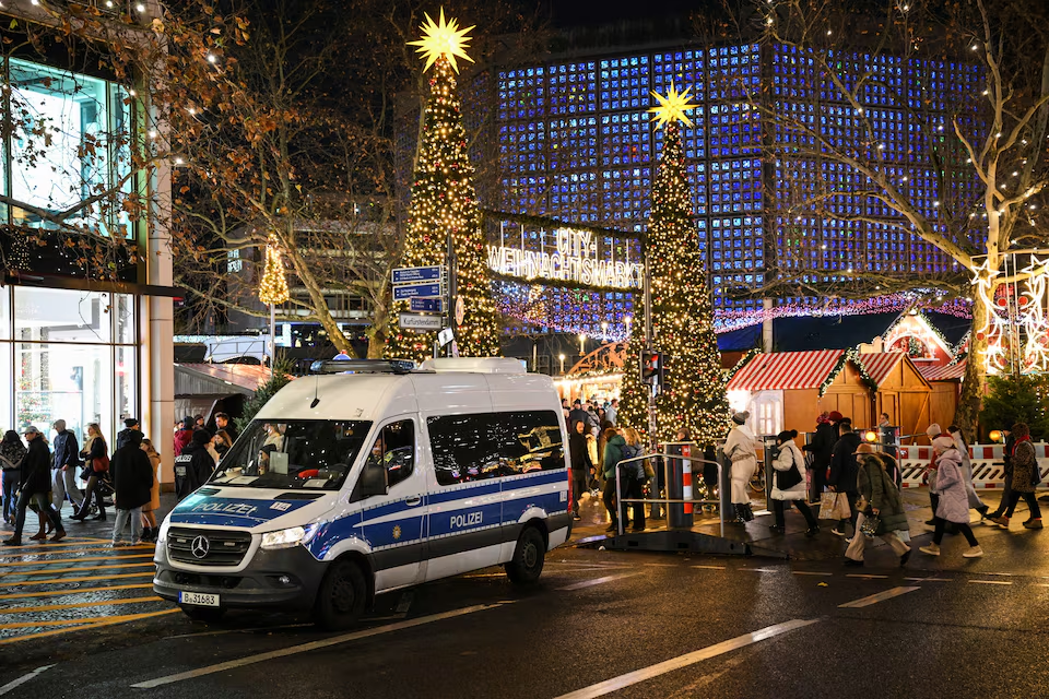 A police car secures an entrance of the Christmas market on the Breitscheidplatz, after a car rammed into a crowd of people at the Magdeburg Christmas market, in Berlin, Germany December 21, 2024. Photo: Reuters