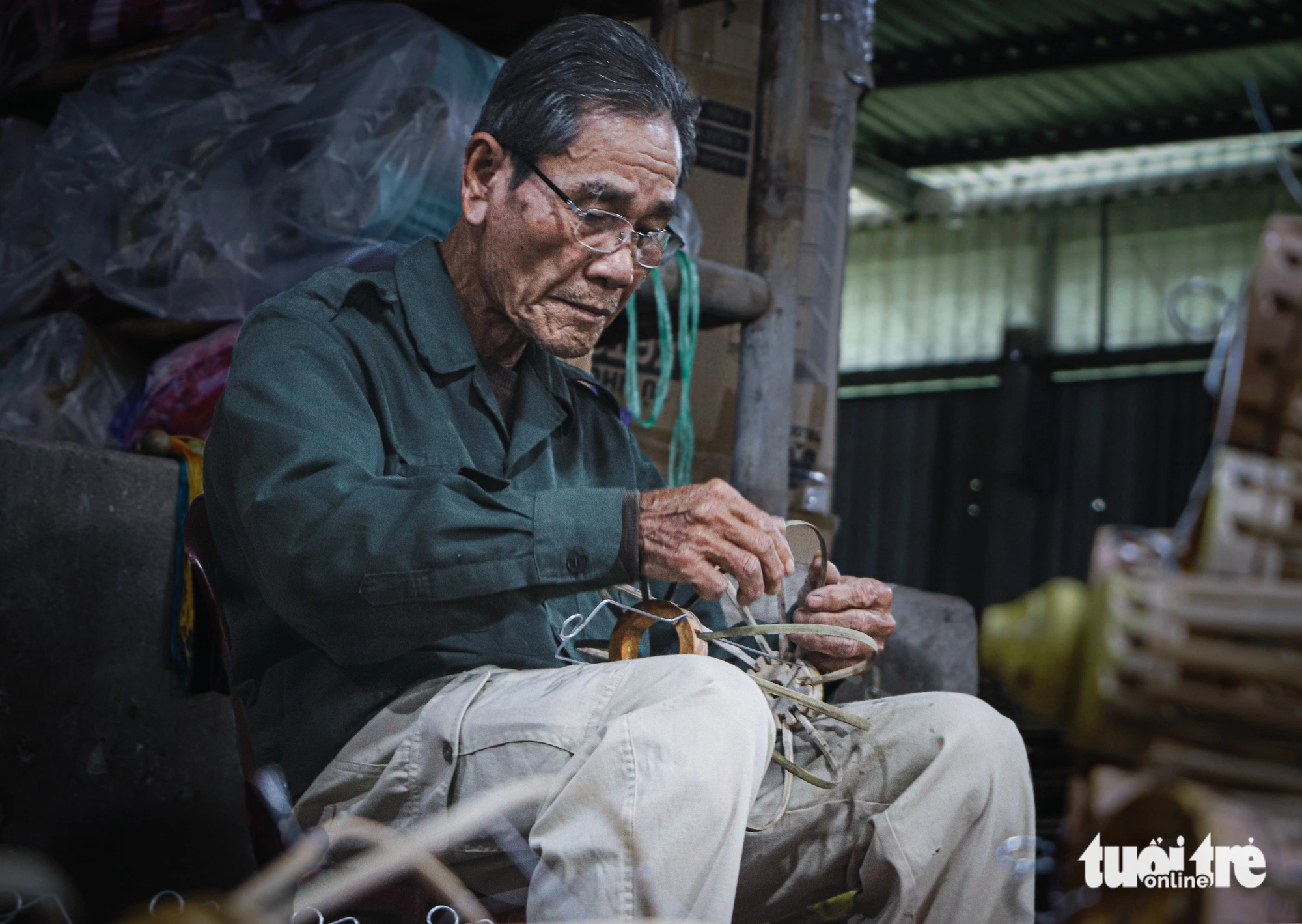 An artisans crafts a lantern in Hoi An City, Quang Nam Province, central Vietnam. Photo: Thanh Nguyen / Tuoi Tre