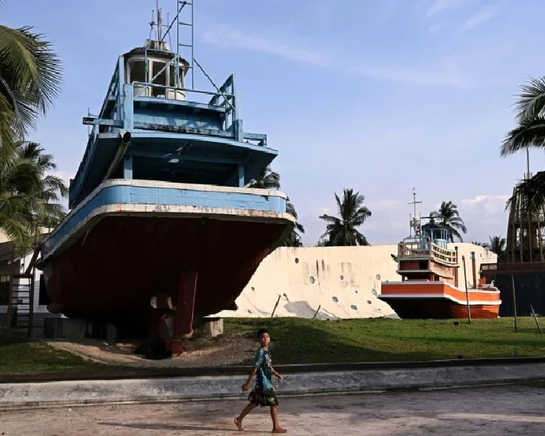 Tears, prayers as Asia mourns tsunami dead 20 years on